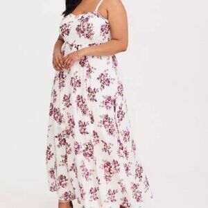 Torrid White floral maxi dress in short length.